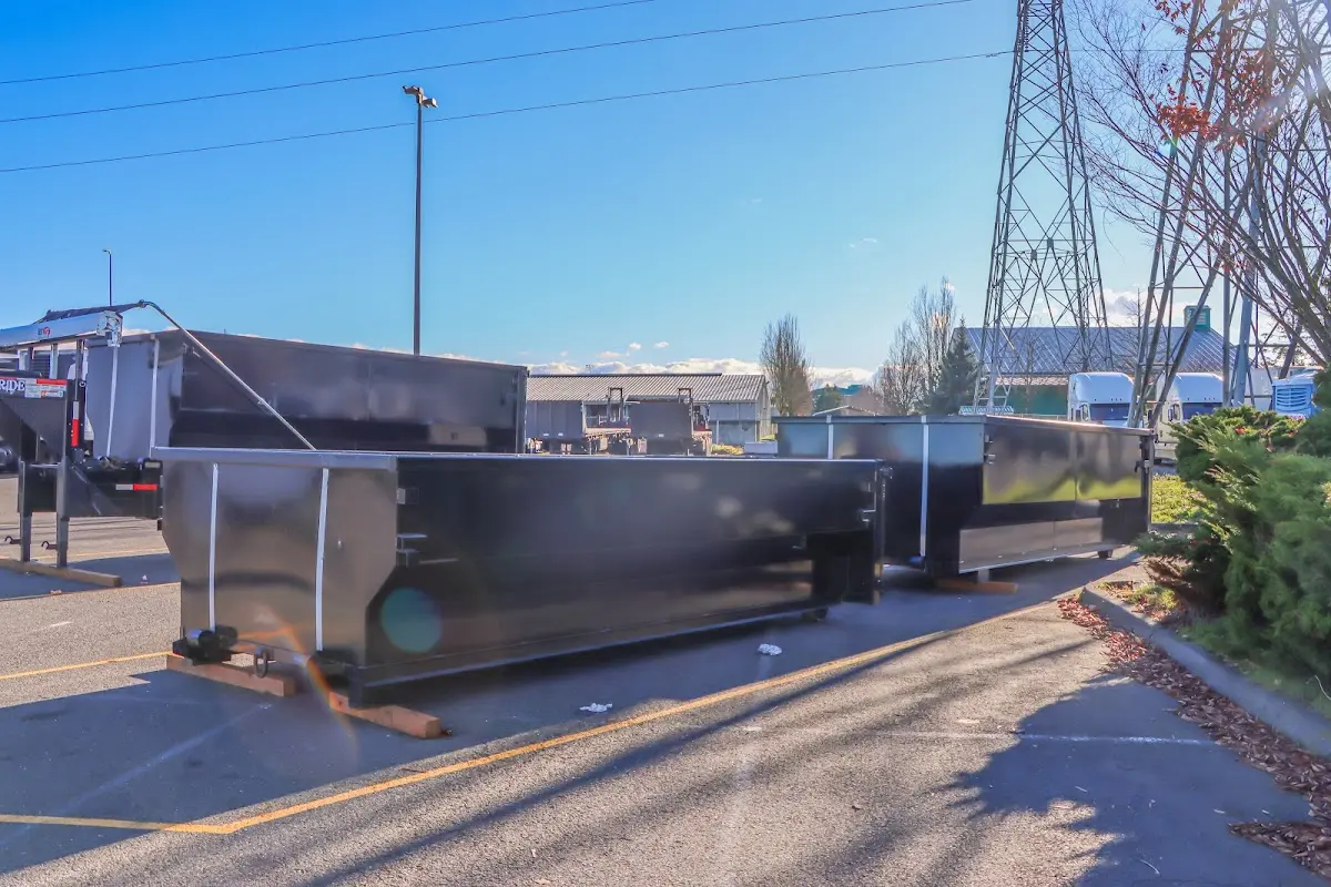 Roll-off dumpster ready for waste disposal at job site for 2 Yard Dumpster Rental in Waite Park